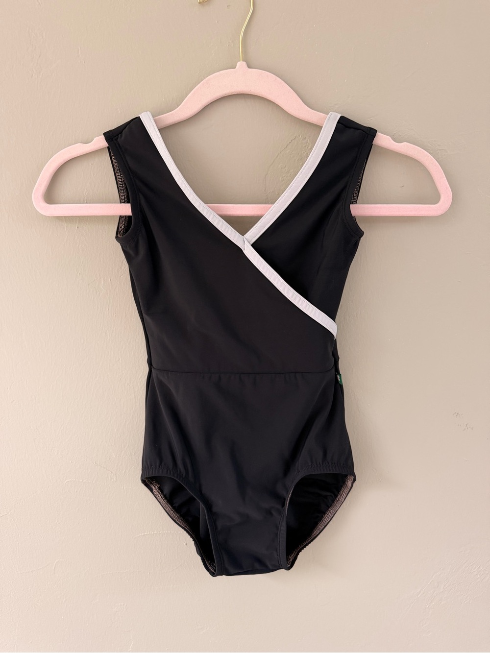 Luckyleo XXS black leotard with white edging.